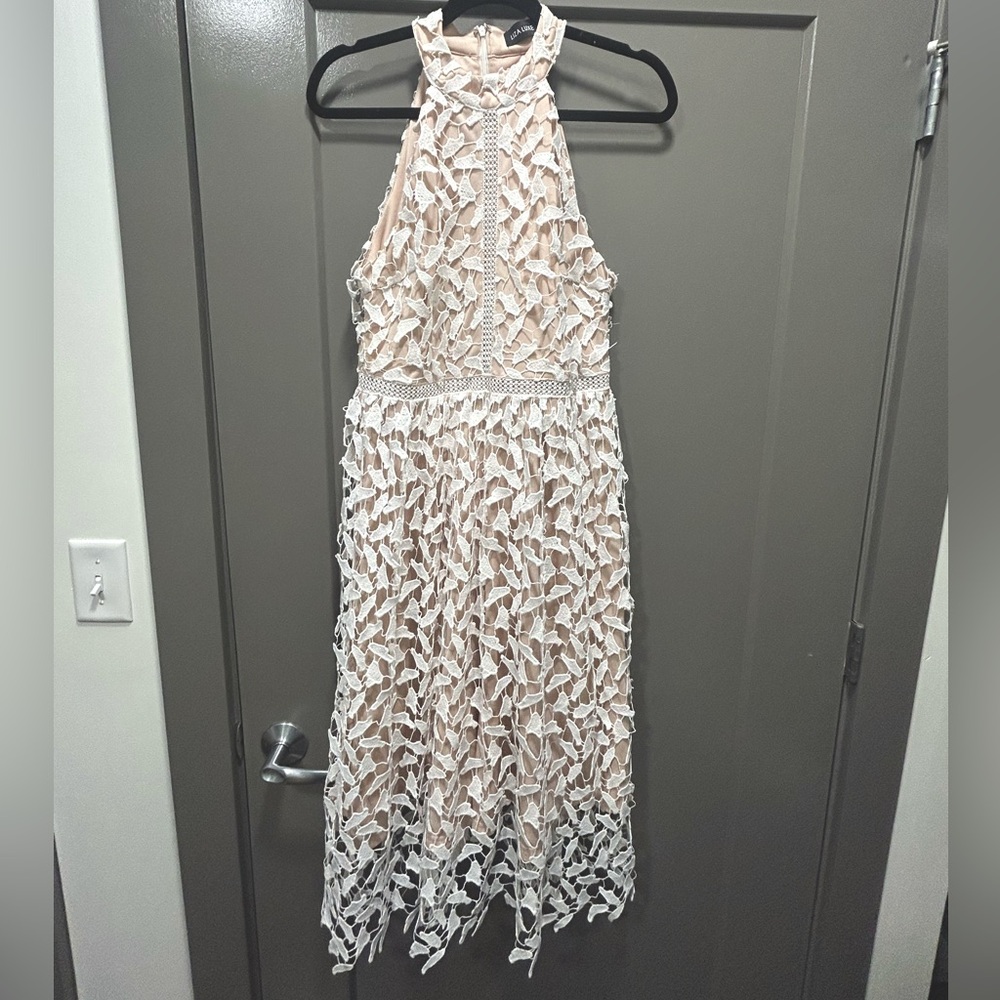 mid-length white lace dress